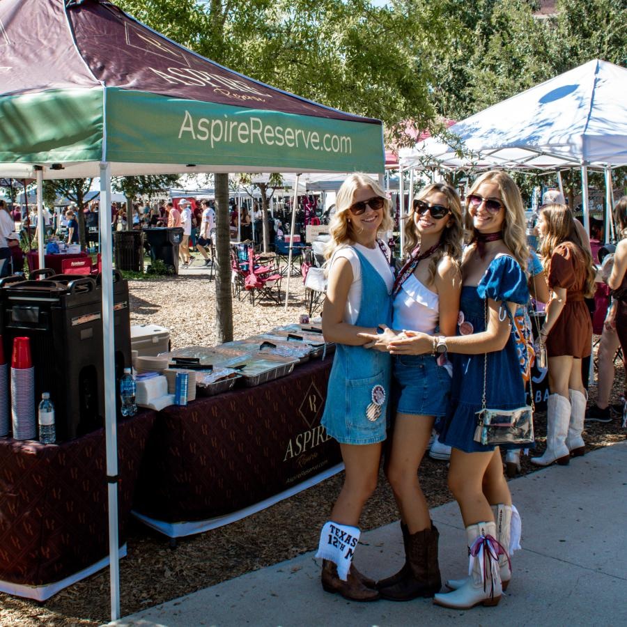 a group of women posing for a picture